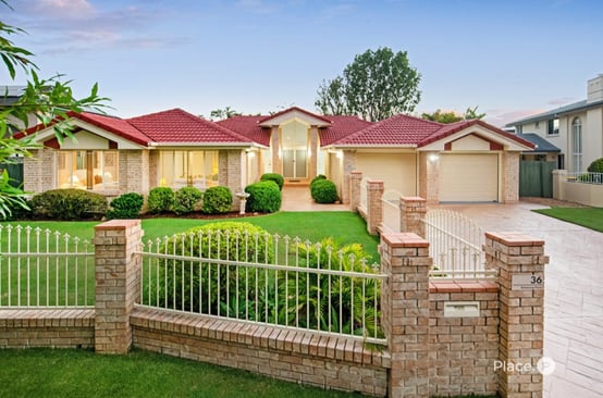 Brisbane suburban investment home exterior with established garden and rental property appeal